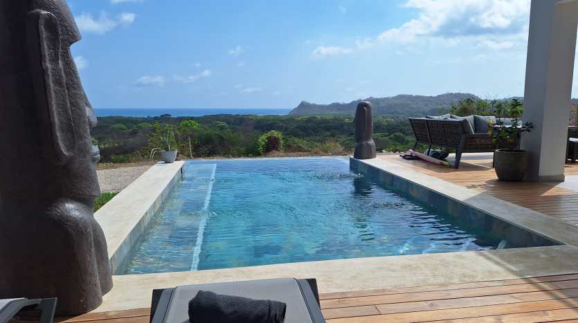 Infinity pool with panoramic ocean view at luxury villa for sale in Samara Costa Rica