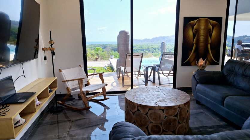 Relaxing lounge area with ocean view inside luxury villa for sale in Samara Costa Rica