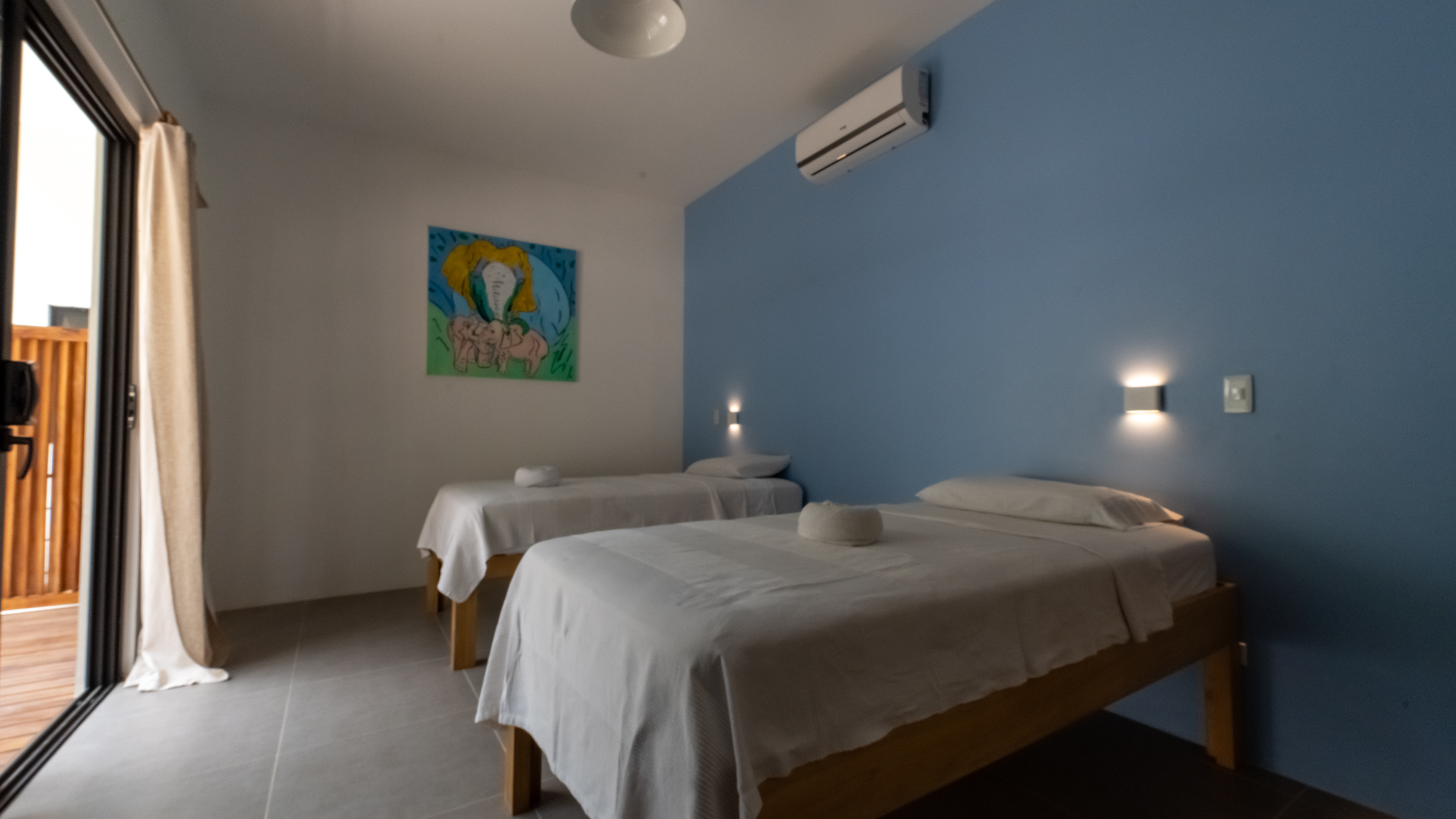 twin bedroom inside jungle villa for sale in samara costa rica