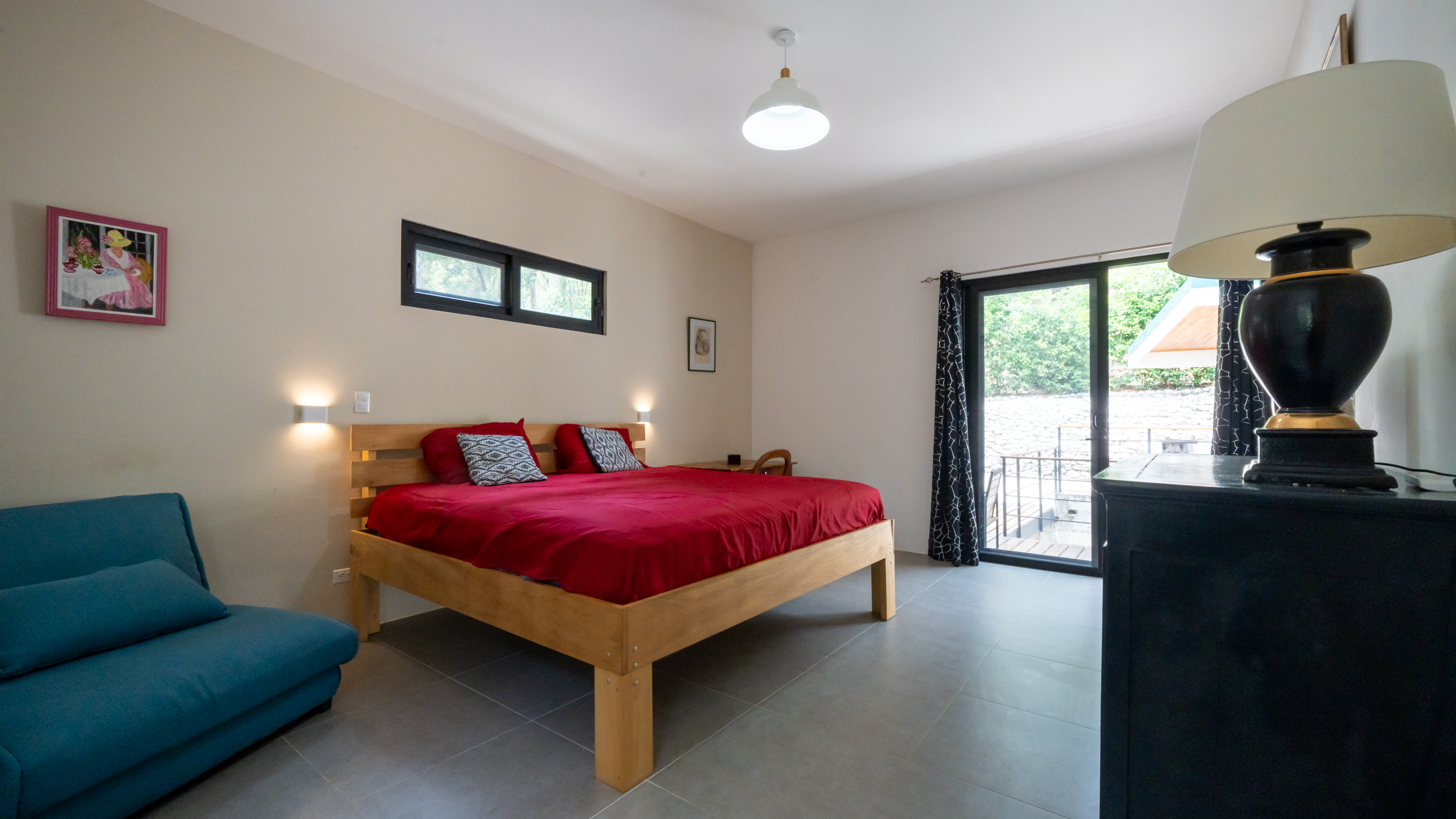 master bedroom with terrace access in villa for sale samara costa rica