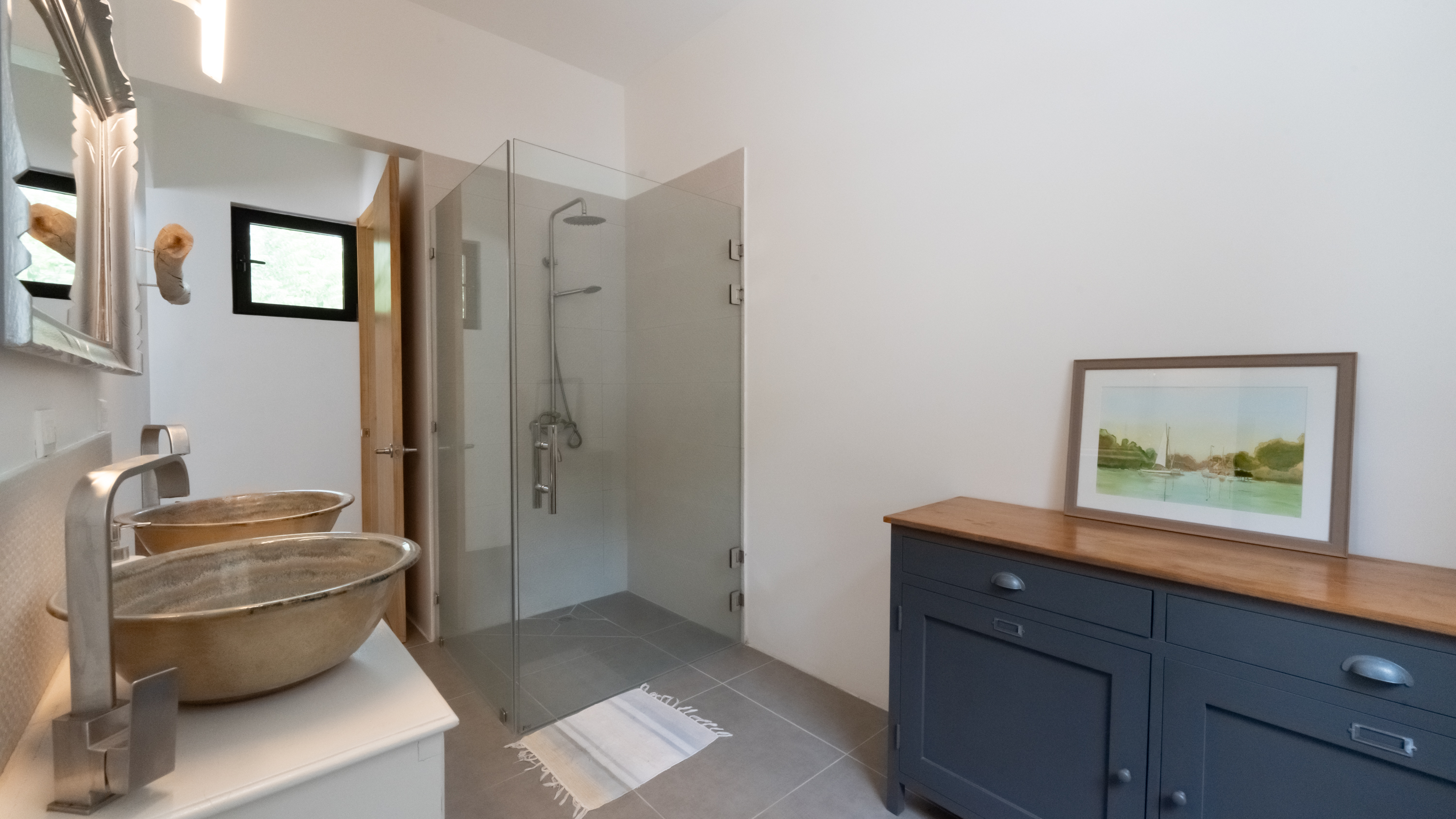 contemporary bathroom with modern sink in villa for sale samara costa rica